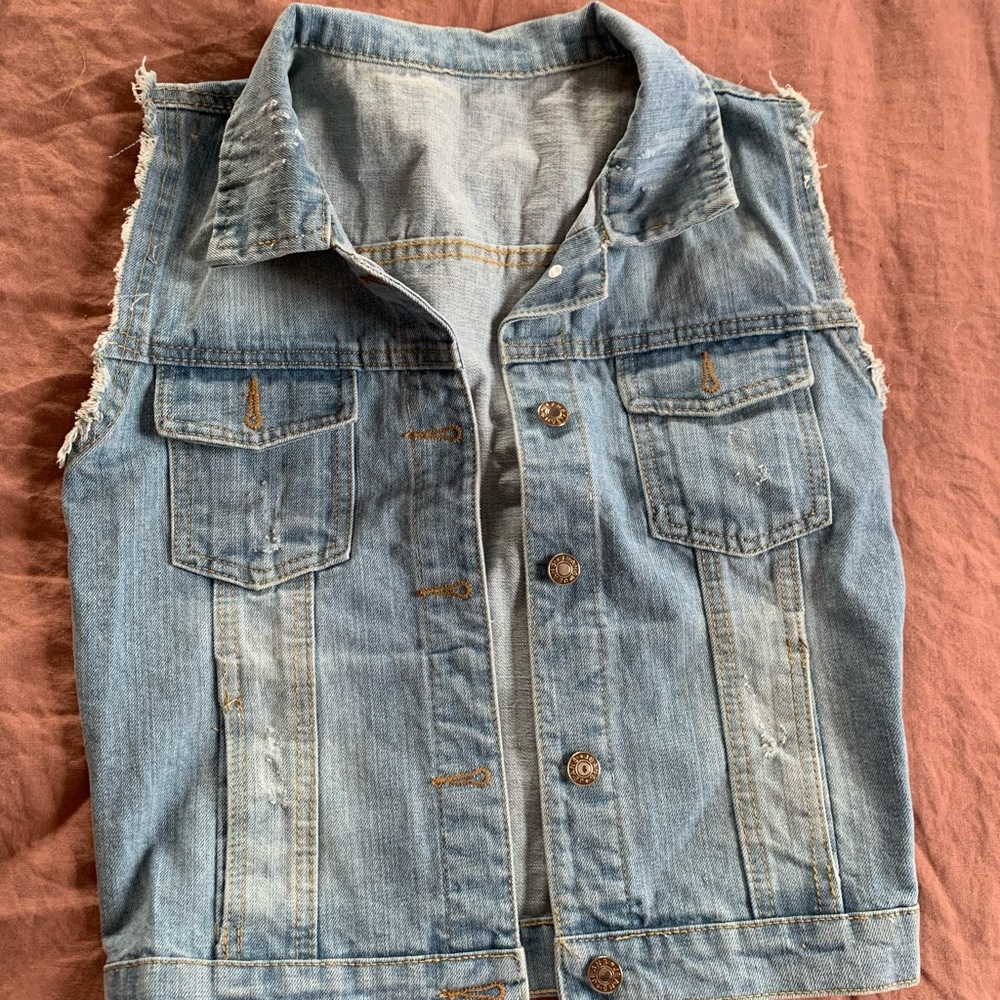 Distressed denim jacket vest